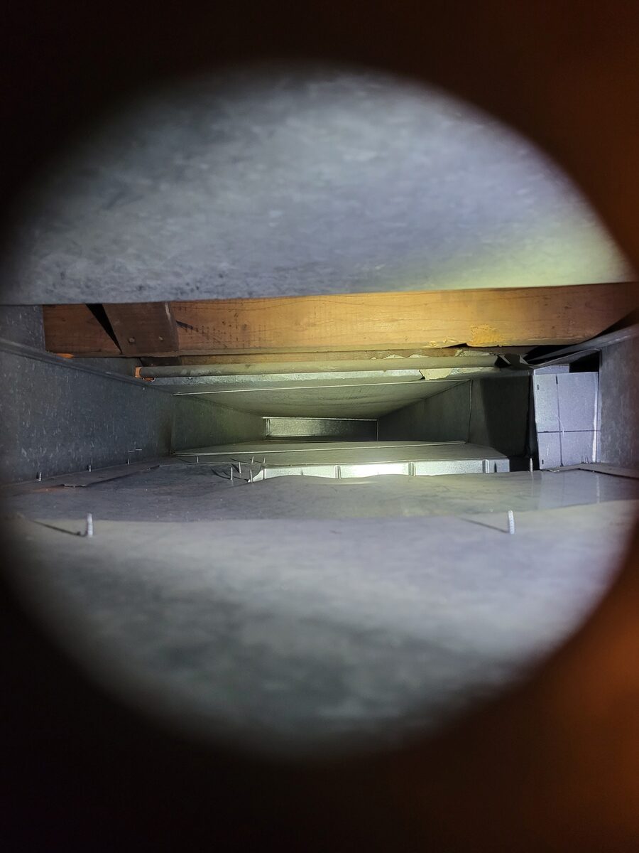The same air duct after SafeAir cleaning and treatment, clean and clear