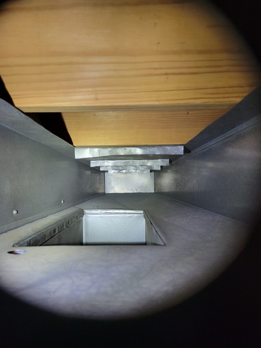 The same air duct after SafeAir Duct Care negative-pressure cleaning, clean and clear